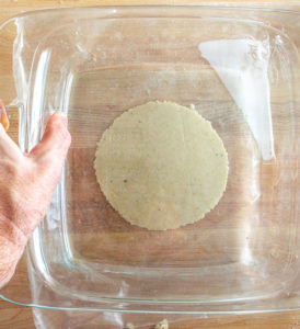 Using casserole dish to flatten dough balls