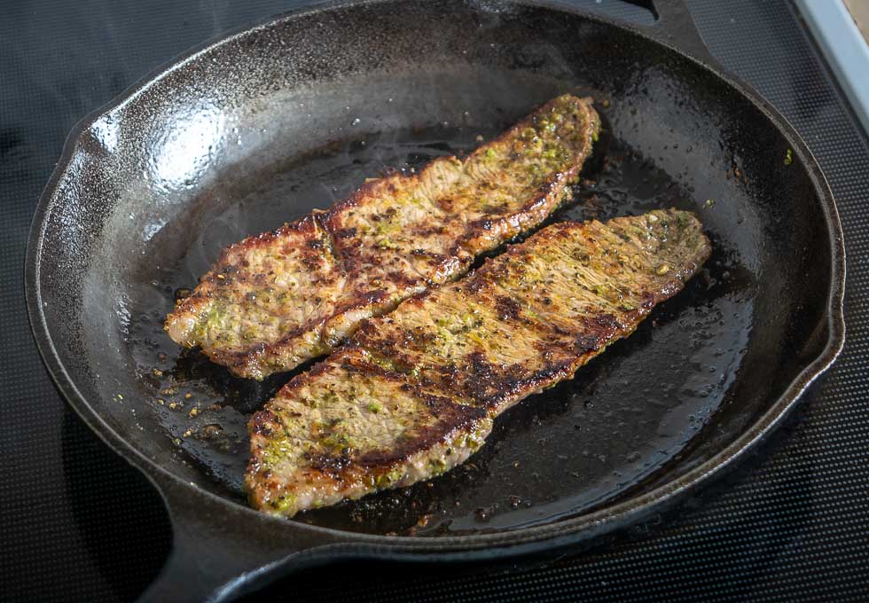 Cooking boneless short ribs in a cast iron pan