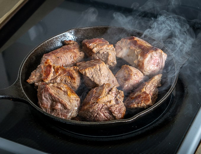 Searing beef brisket for Birria de Res