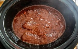 Adding red sauce to slow cooker