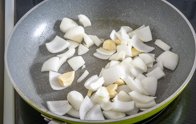 Saute onion and garlic over medium heat