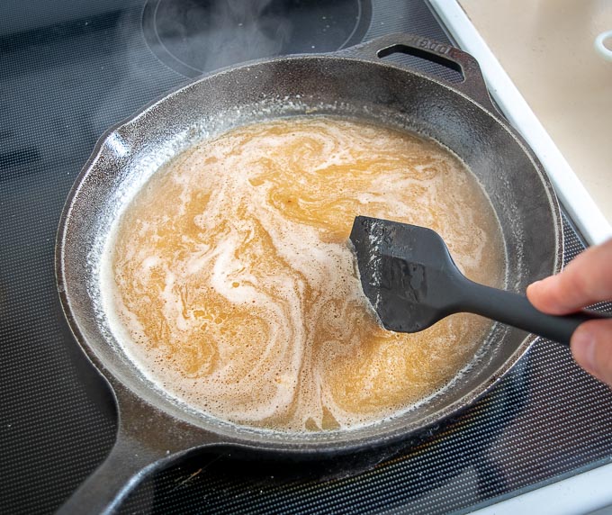 Adding vegetable stock to deglaze the pan