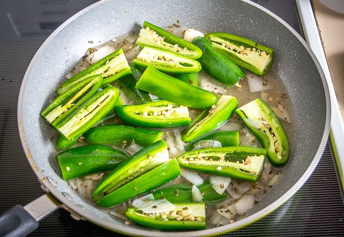 Adding a single pound of jalapenos to the pan