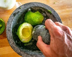 Using mano to smoosh the avocado