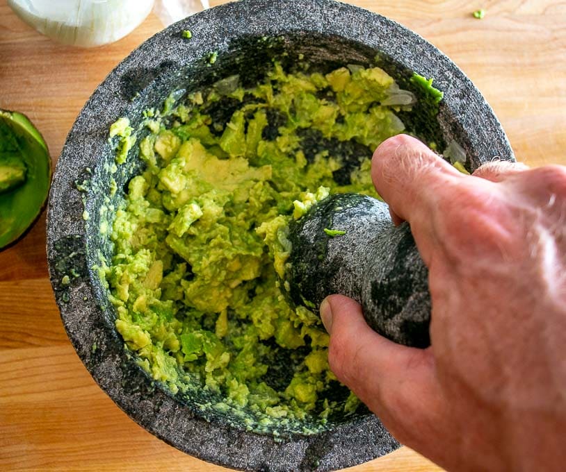 After grinding down the avocado in the molcajete