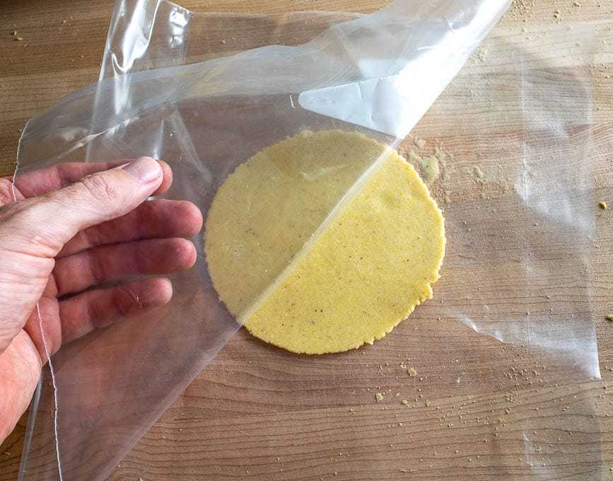 Flattening dough balls with a casserole dish