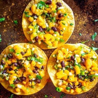 This Mango Black Bean Salsa has been a refreshing change of pace for my kitchen lately. I served it on crispy tostada shells along with a dusting of chile powder and it was delicious!