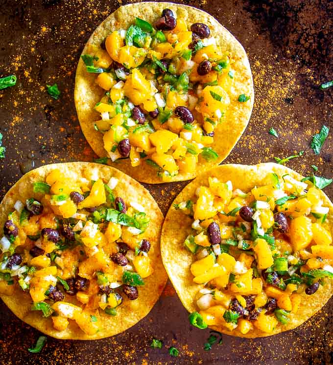 This Mango Black Bean Salsa has been a refreshing change of pace for my kitchen lately. I served it on crispy tostada shells along with a dusting of chile powder and it was delicious! 