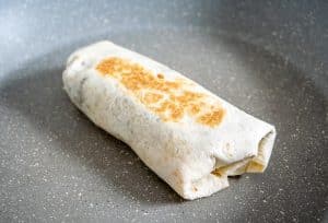 Crisping up breakfast burrito in a dry skillet
