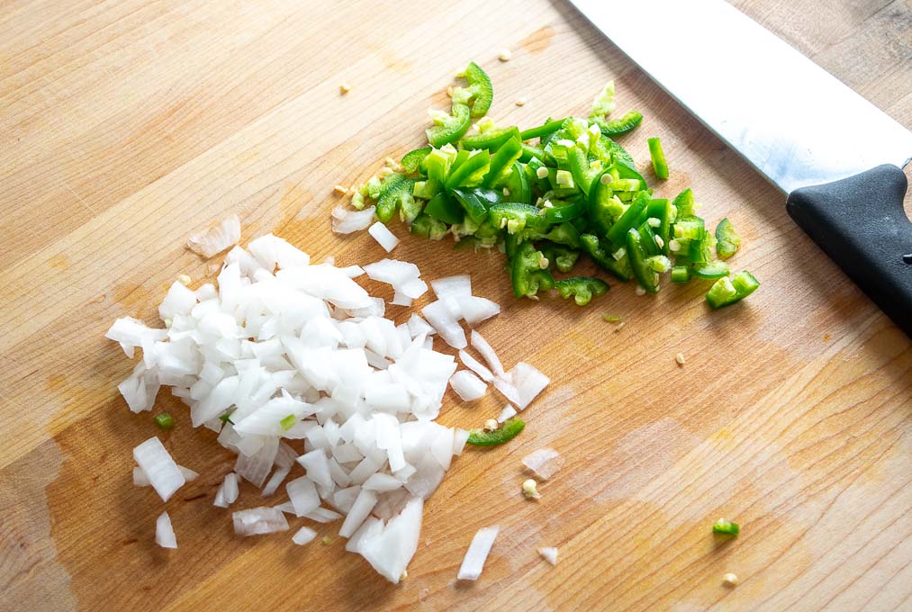 2-3 tablespoons of finely chopped onion and jalapeno