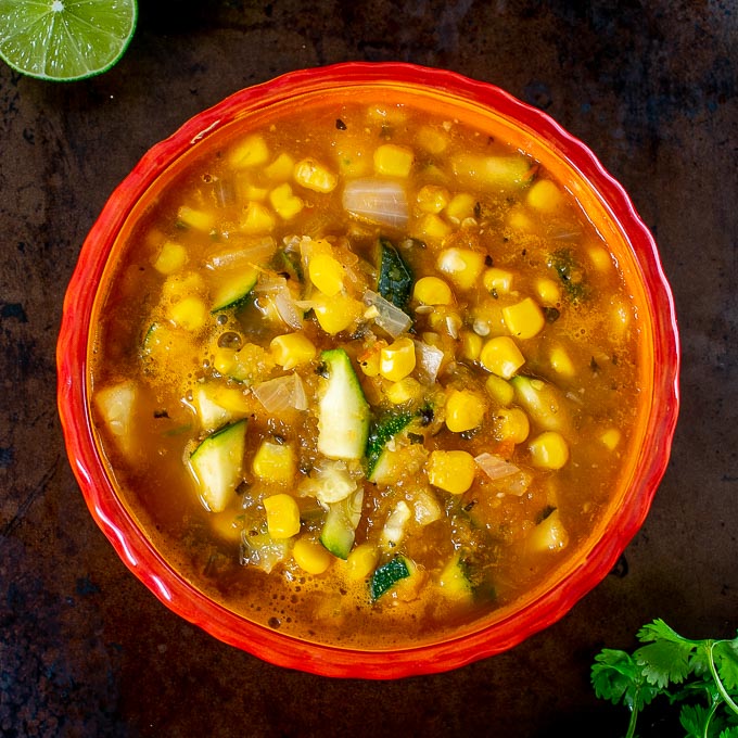 Serving Calabacitas Soup in a bowl