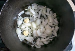 Cooking onion and garlic for the broth