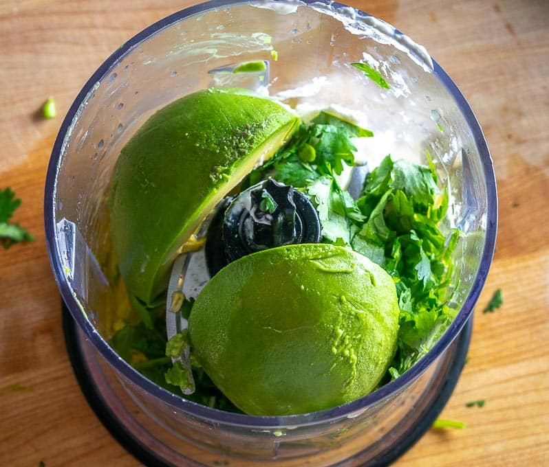 Adding ingredients to blender for Avocado Dressing