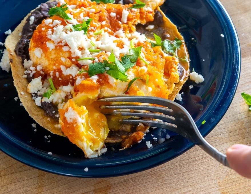 Yesterday I poached some eggs in Chipotle Salsa and they were delicious! I served them on top of some tostadas along with a layer of refried beans. mexicanplease.com