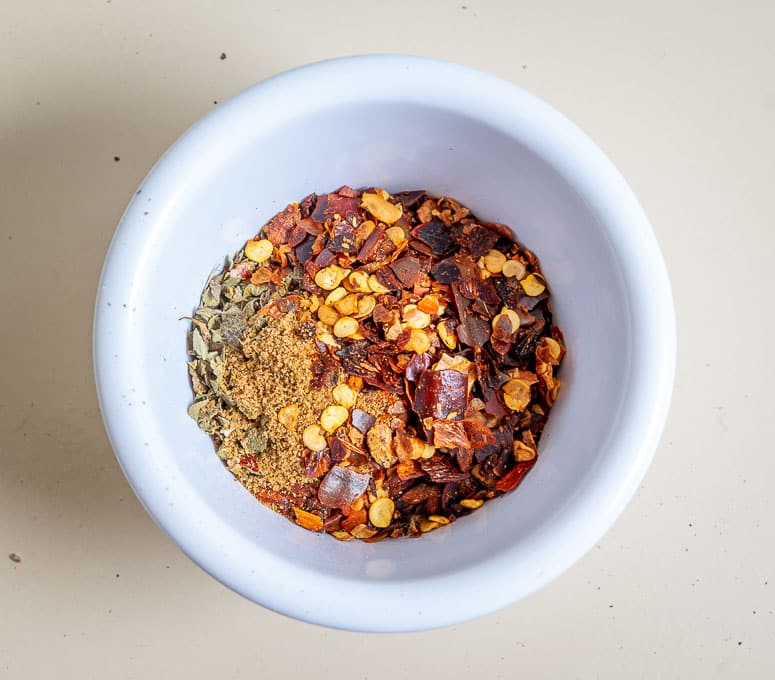 Bowl full of spices for the ground beef