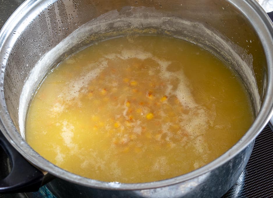 Bringing 2 cups of popcorn kernels to a simmer
