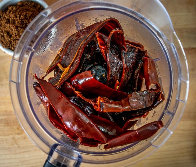 Adding reconstituted chiles to the blender