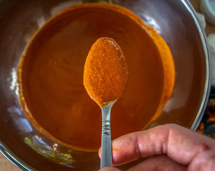 Spoonful of strained Mole Coloradito sauce