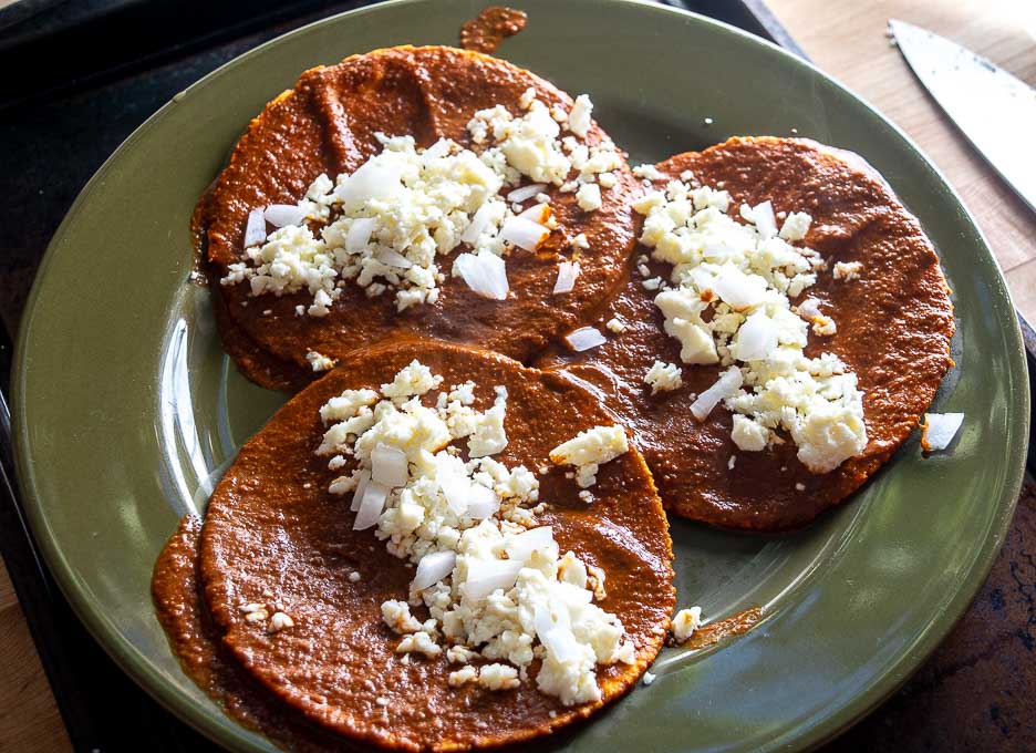 Mole Coloradito served up Entomatadas style