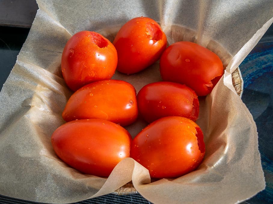 Roasting 2 lbs. tomatoes for the Mole sauce