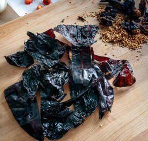 Ancho and New Mexican dried chiles after being de-stemmed and de-seeded