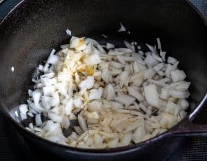 Saute a finely chopped onion in another glug of oil