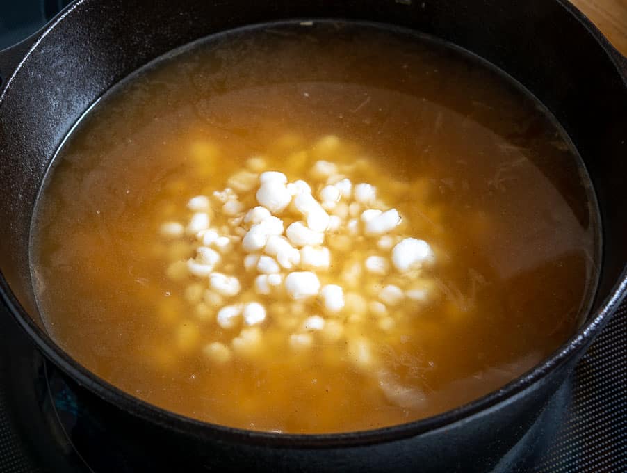 Adding hominy to the broth