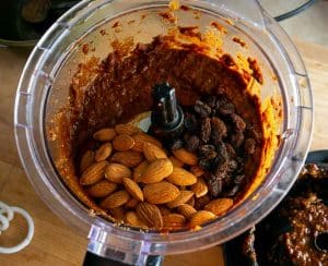 Adding raisins and 1/4 cup almonds to the chile puree