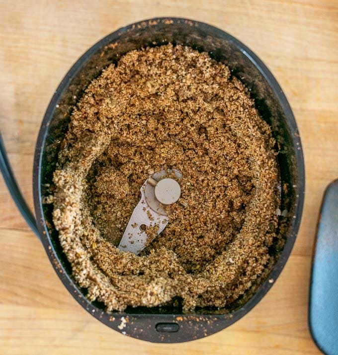 Grinding up dried spices in a spice grinder