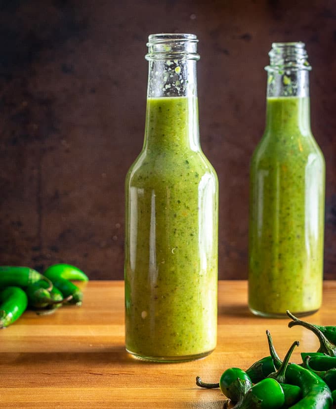 Here's an easy recipe for a wicked batch of Serrano Hot Sauce! With a half pound of Serranos you'll get two bottles worth of delicious, fiery hot sauce. 