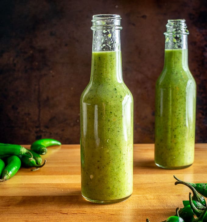 Here's an easy recipe for a wicked batch of Serrano Hot Sauce! With a half pound of Serranos you'll get two bottles worth of delicious, fiery hot sauce. 