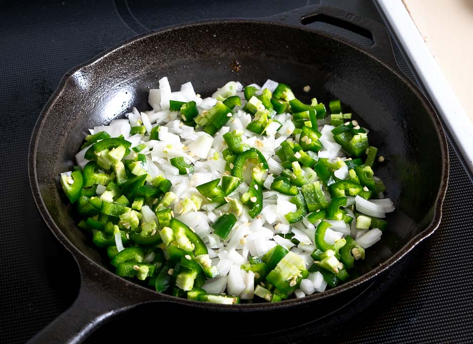 Cooking onion and jalapeno for the tacos