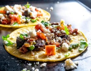 This is an easy, quick recipe for a one pan batch of Tacos de Alambre. I topped the tacos with Salsa de Aguacate and they were delicious! mexicanplease.com