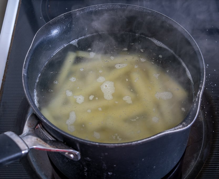 Parboiling the potatoes