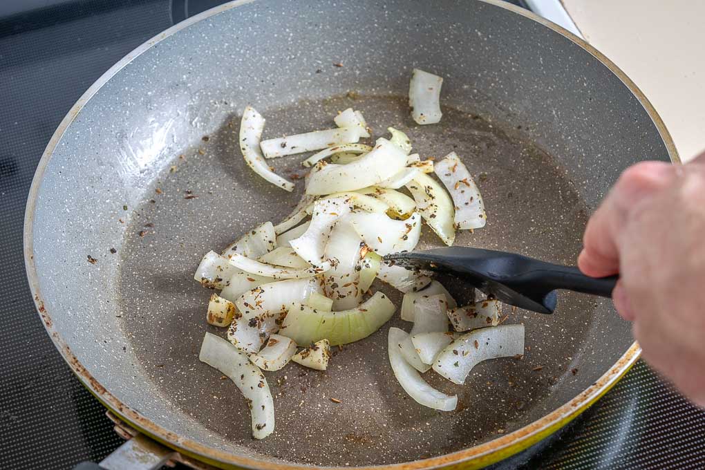Adding spices to the pan