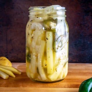 What a treat to have a jar of these PIckled Potatoes in the fridge! I used 3 jalapenos to give them some kick but you can always use less for a milder batch. mexicanplease.com