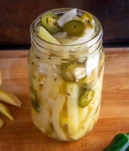 Filling quart sized Mason jar with Pickled Potatoes