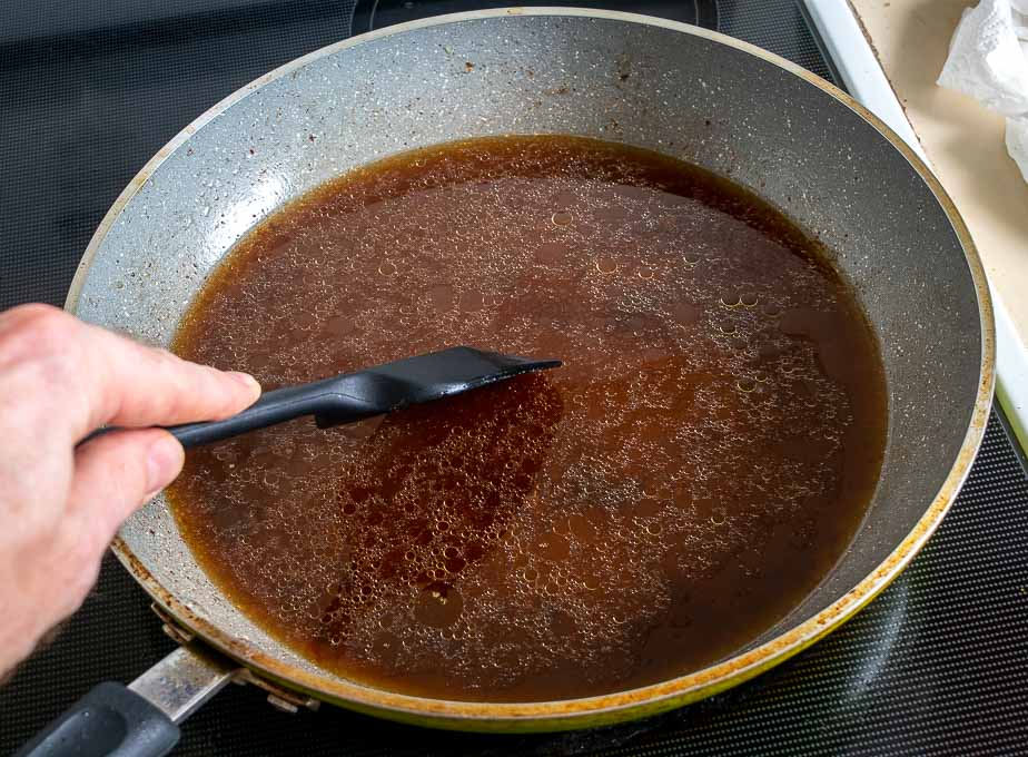 Deglazing beef pan with stock
