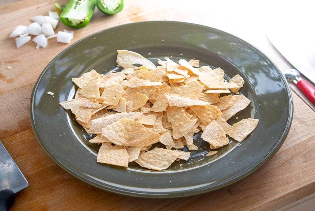 Five crumbled tostada shells