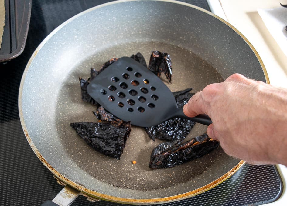Using stovetop method to roast dried chiles