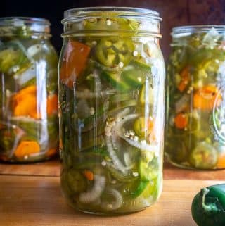 This recipe is perfect if you want to give away some Pickled Jalapenos to your friends and family! Start with 4 lbs. of jalapenos and you'll get four quarts of pickled heaven.