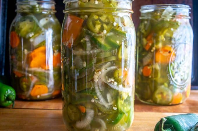This recipe is perfect if you want to give away some Pickled Jalapenos to your friends and family! Start with 4 lbs. of jalapenos and you'll get four quarts of pickled heaven.