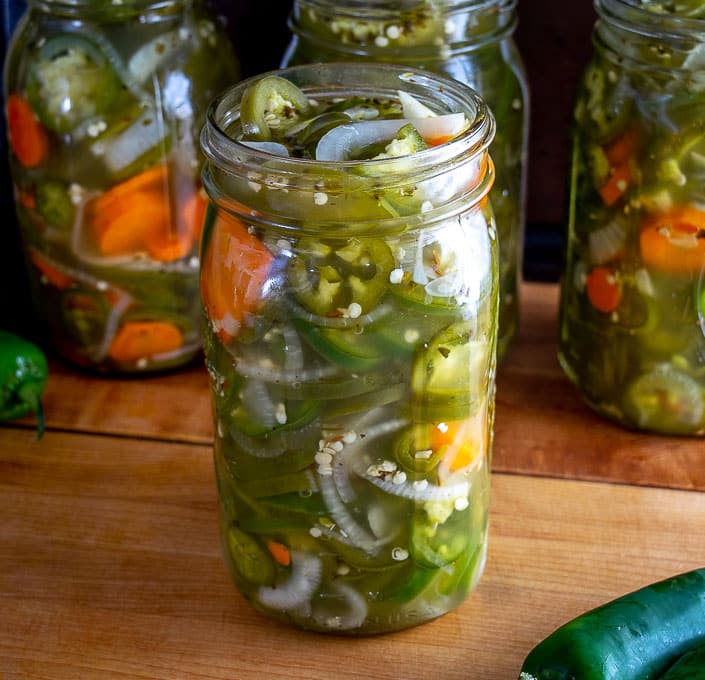 Four pounds worth of pickled jalapenos in quart-sized jars