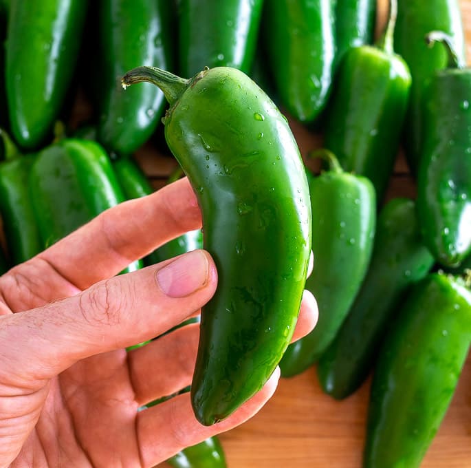 Single fresh jalapeno before simmering