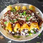 plate full of black bean enchiladas