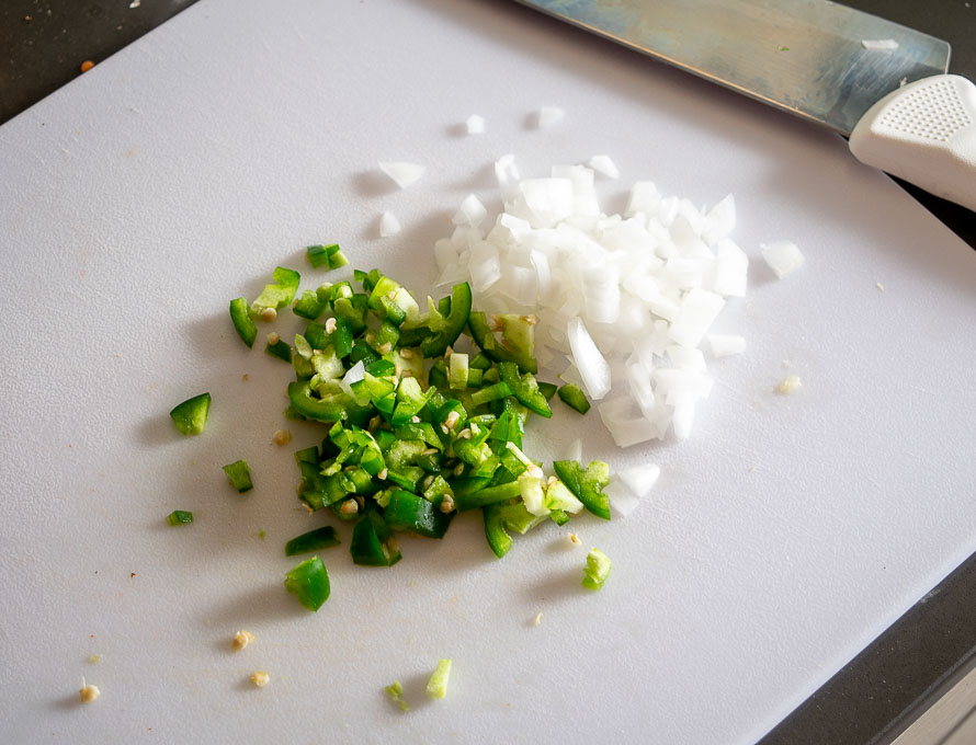 Finely chopped onion and jalapeno for the bean rice mixture