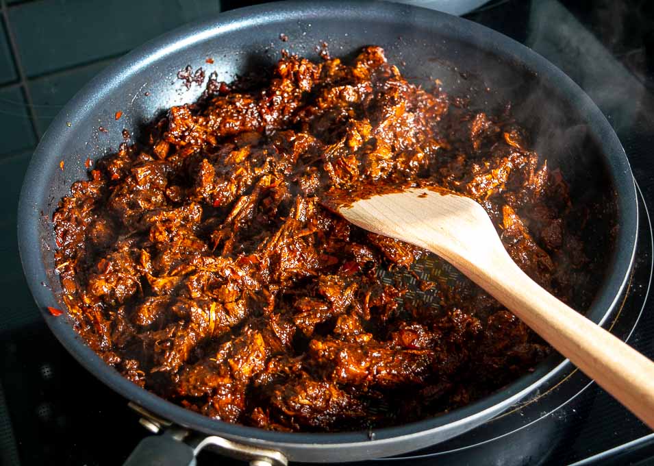 Here's an easy recipe for a big batch of savory shredded pork in adobo sauce -- perfect for tacos, burritos, tostadas, and even tortas!