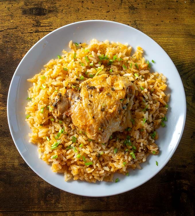 Chicken thighs over rice Arroz con Pollo