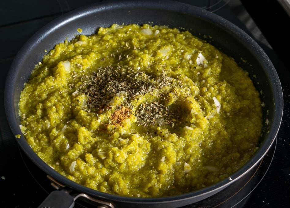 Adding blender full of Hatch chiles to the pan