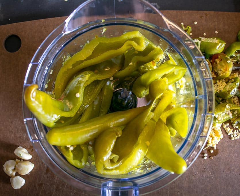 De-stemming and de-seeding the Hatch chiles. 